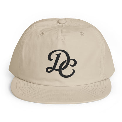 Ecru DC Surf Cap, front view, featuring Kelly Towles Washington, DC artwork.